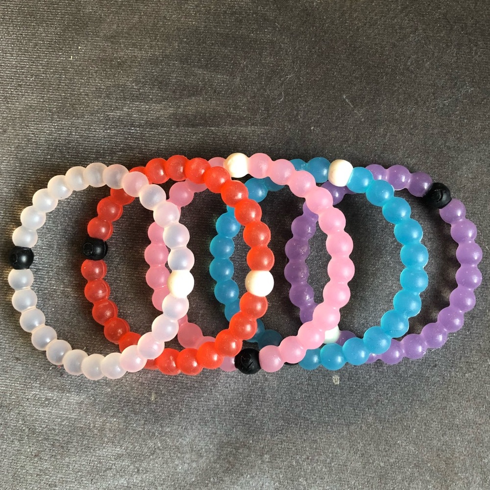 5 gently used lokai bracelets each bracelet is $9
